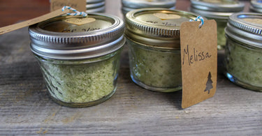 Green onion salt in small mason jars with homemade name tags