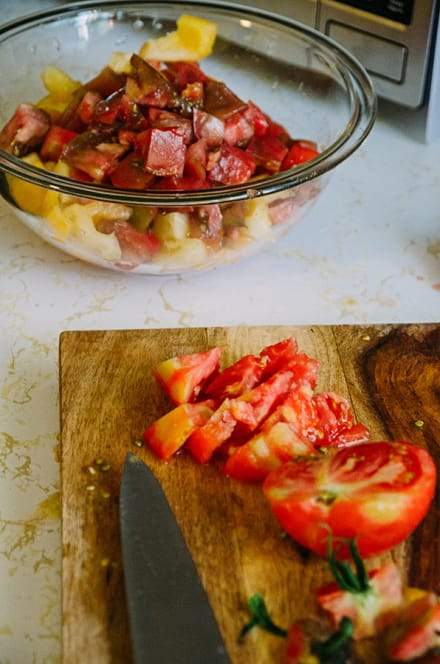 Freshly diced red and yellow garden tomatoes.